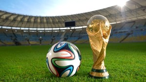 The World Cup, featured with the official match ball, Brazuca. Photo Credit: FIFA