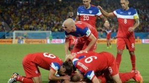 American players celebrate after John Brooks scored a winning goal against Ghana. Photo Credit: AFP