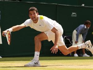 Grigor Dimitrov upset defending champion Andy Murray 6-1 7-6 6-2. Photo Credit: AFP