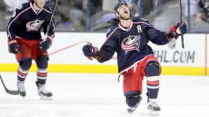 Brandon Dubinsky, right, celebrates after scoring the game-tying goal in Game 4. Photo Credit: AP